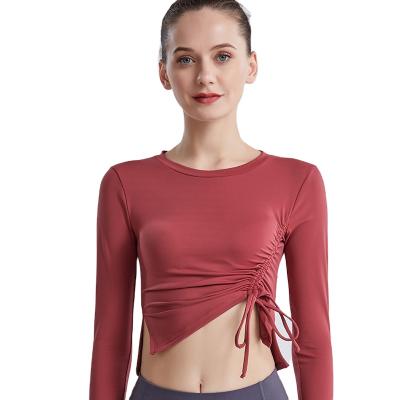 China 2021 breathable autumn and winter new yoga wear women's bow-knot thin drawstring quick-drying tight sports fitness long-sleeved top for sale