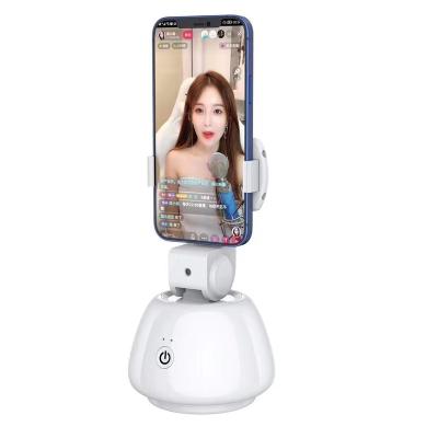 China 2022 New Technology Adjustable Portable Smart Face AI 360 Automatic Shooting Rotate Object Pursuit Cell Phone Holder for sale