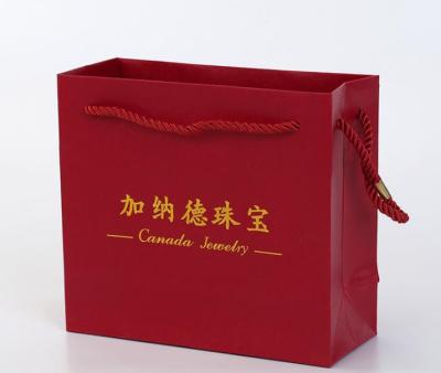 China Small Durable Jewelry Paper Shopping Bag With Rope for sale