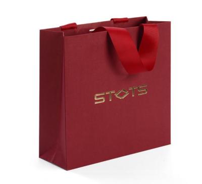 China Jewelry Durable Paper Bag With Gold Foil Logo for sale