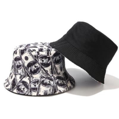 China 2021 new image fashion bilateral wear funny printing hat dollar money printed bucket hats for sale