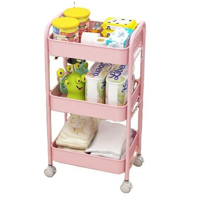 China Sustainable trolley rack kitchen floor shelf bathroom living room mobile shelf snack multi-layer Roller Storage Rack for sale