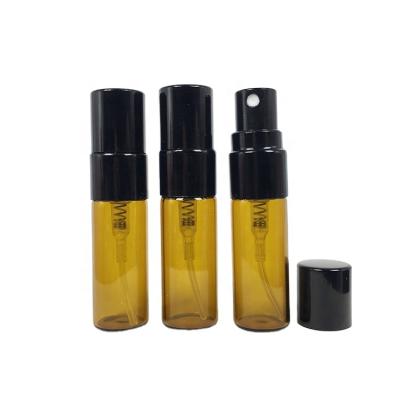 China Cosmetic Amber Glass Spray Bottle Round Perfume Bottles 3ml Transparent Cosmetic Spray Bottles Glass Oil Packaging for sale