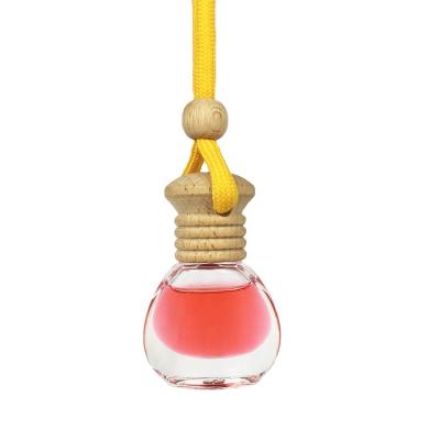 China Wholesale Party Hanging Car Perfume Bottle Cap 5ml Car Air Cosmetic Wooden Empty Diffuser Bottle Empty Party Hanging Wholesale for sale