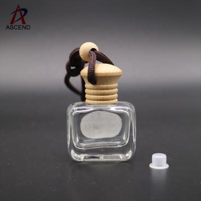 China Wooden Car Fancy 10ml Empty Hat Personal Care Diffuser Bottle Hanging Perfume Bottle for sale