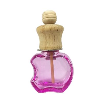 China 10ml Apple Shape Cosmetic Car Diffuser Bottle Vent Clip Glass Empty Car Perfume Bottles With Clip for sale