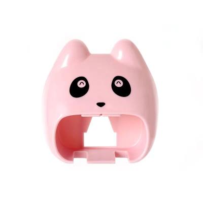 China PP plastic material non-perforated adhesive cartoon plastic pp toothbrush holder for sale