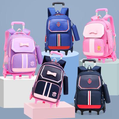 China Waterproof Back Trolley Schoolbag Pull Primary School Dual-Use Detachable Stair-climbing Schoolbag for sale