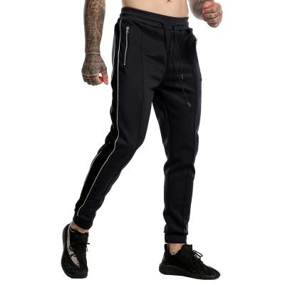 China Gym Jogging Leg Skinny Sweatpants Running Men's Elastic Casual Sportswear QUICK DRY for sale