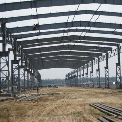 China Steel Fabricated House Arch Prefab Steel Warehouse Shade Structure for sale