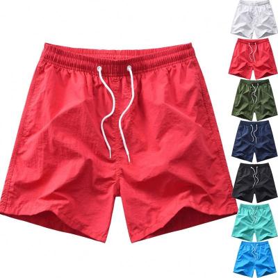 China Custom QUICK DRY Logo Print Made Men's Beach Wear Casual Beach Shorts Men's Athletic Sports Shorts for sale