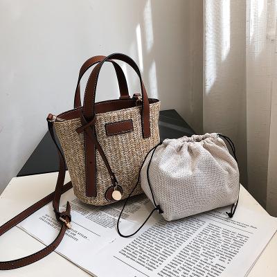 China New Hot Summer Beach Fashion Bag Simple Portable Bucket Straw Bag Small Out Of Fashion Handbag for sale