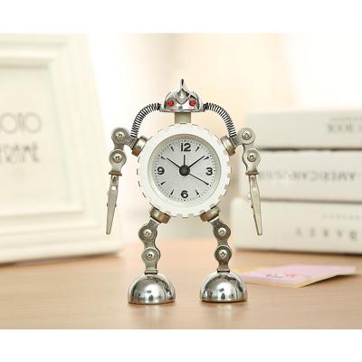 China With eys Speed ​​Robot Flashing Alarm Clock With Flashing Eyes And Hand Clip Creative Student Table Timing Equipment for sale