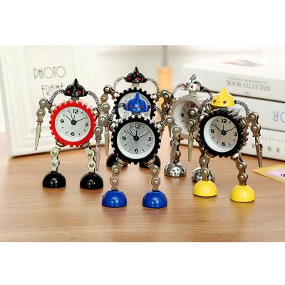 China With eys Small Vintage Metal Gear Robot Flashing Desk Alarm Clock with Hand Clips and Flashing Eyes for Student for sale