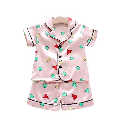 China 2020 new kids wear QUICK DRY pajamas girls polka dot triangle print comfortable flat children's collar pajamas for sale