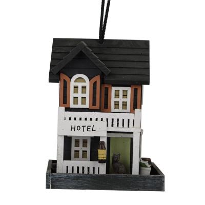 China The viable hotel wooden bird feeder there is a cat in front of the door for sale