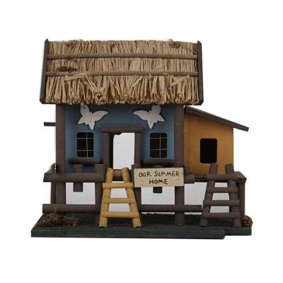 China Sustainable rustic wooden decorative bird house with bird feeder garden decor, wood with thatched roof for sale