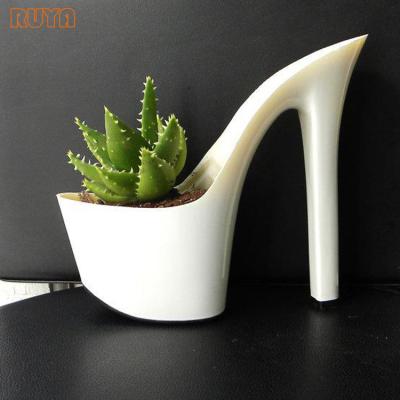 China Indoor& RUYA Special Creative Fiberglass Heel Shoe Planter Outdoor Planting Pots H120cm for sale