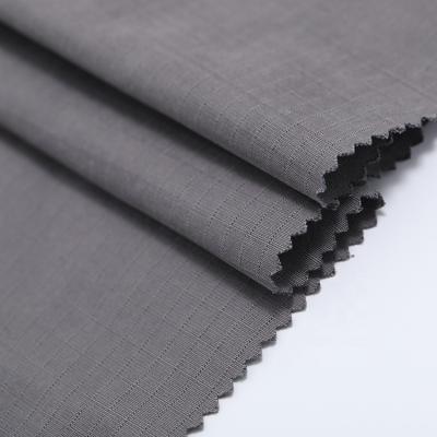 China Polyester Anti-static Outdoor Nylon Cotton Peach Blended Fabric Woven Fabric Spandex Blended Fabric for sale