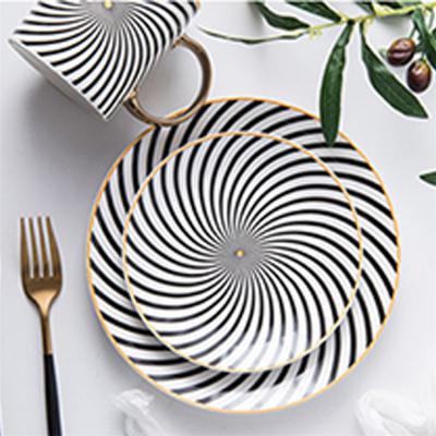 China Sustainable Hotel Special Design Modern Dinner Plate Set Gold Rim Ceramic Dinner Set Dinnerware for sale