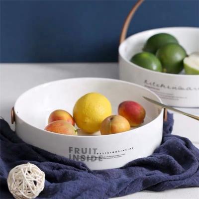 China Disposable handmade decorative white color ceramic modern fruit bowl in round shape with logo for sale