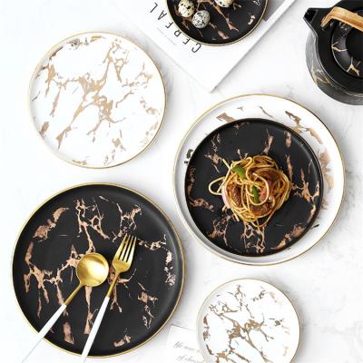 China Hotel disposable porcelain cheap wholesale price charger marble dish with gold rim for sale for sale