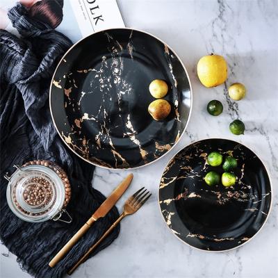 China Stocked Ware Exquisite Marble Ceramic Serving Dish Charger Black Dishes For Restauratant for sale