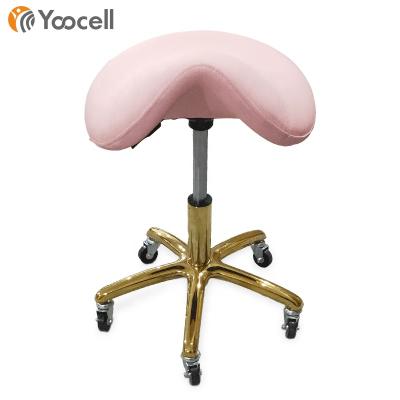 China Hot Sale Yoocell Material Pink Color Saddle Rolling Stools Durable Material Salon Beauty Equipment Master Chair for sale