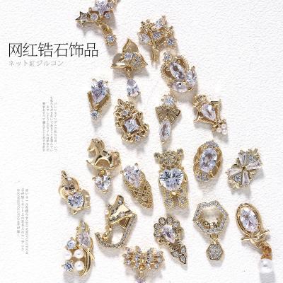 China For Nail Art Nails Art Zircon Gold Metal Nail Decorations Designers Charm 3d Luxury Flexible Nail Art Accessories for sale