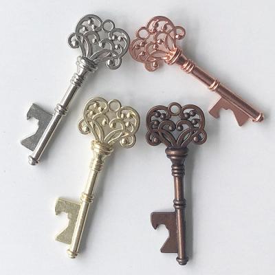 China Key Shaped Marriage Favors Opener Master Chain Bottle Opener Grasp for sale