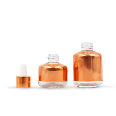 China Personal Care In Stock 30/50ml Rose Gold Aluminum Packaging Essence Oil Dropper Glass Bottle for sale