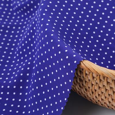 China Sustainable Chiffon Navy New Product White Polka Dots Printed Polyester Fabric for sale