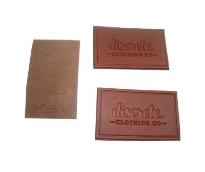 China Genuine Custom Leather Labels Bespoke Longlasting Die Cut Border Velcro Backing for sale