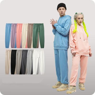 China Breathable High Street Breeches Solid Color Cotton Mens Loose Trouser Pants Mens Sweatpants With Pockets for sale