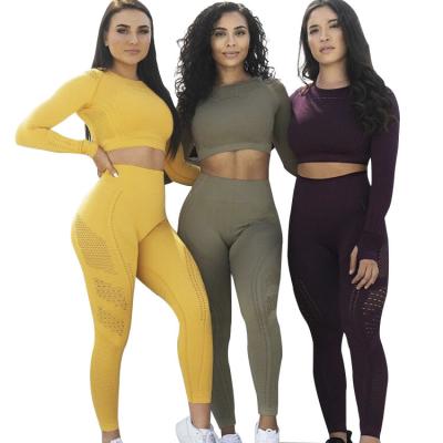 China Breathable Long Sleeve Crop Tops Hollow Out Legging Women Yoga Sets High Quality Fitness Active Wear Seamless Yoga Set for sale