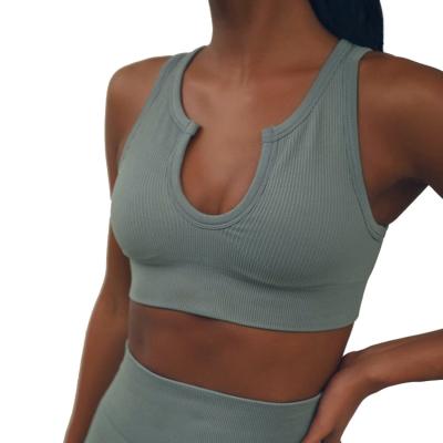 China Breathable Seamless Sports Bra Solid Color V-Neck Fitness Women Yoga Bra Top for sale