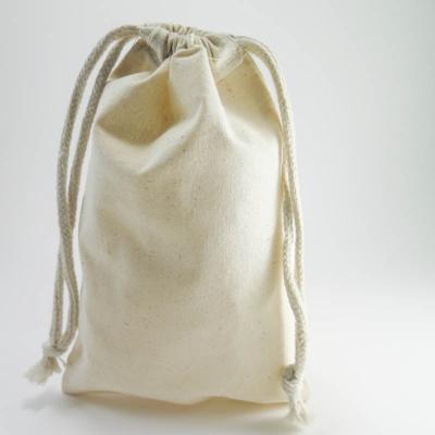 China Recyclable Organic Cotton Muslin Canvas Cotton Grain Pouch Packing Drawstring Bags For Food for sale