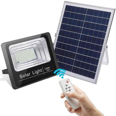 China Outdoor High Bright 100w Garden Security Led Solar Flood Light With Remote For Yard Garden Pathway for sale