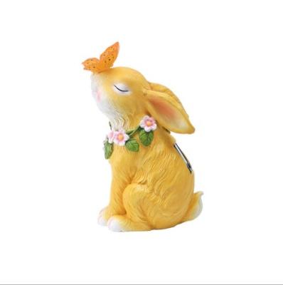 China Novelty Cartoon Butterfly Rabbit Decoration Solar Light Outdoor Fairy Garden Ornaments Creative Yard Resin Mold Statues Decor for sale