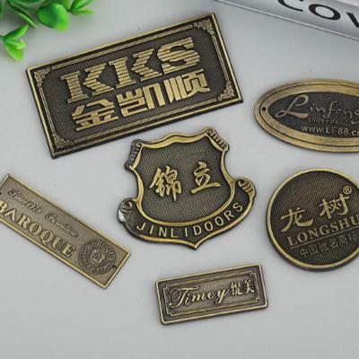 China Anti-Counterfeit Logo Perfume Bottle Label Sticker Custom Gold Embossed Label Metal Sticker Plastic Label for sale