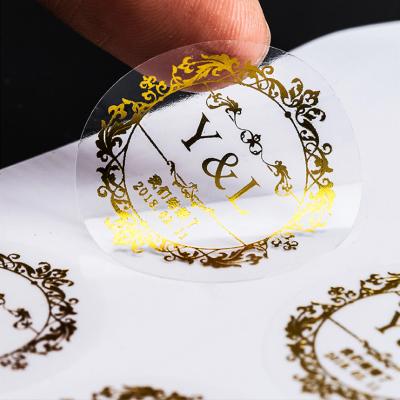 China Waterproof Custom Logo Round Clear Self Adhesive Printing Clear Wrapping Rose Gold Foil Vinyl Roll Labels Sticker for sale