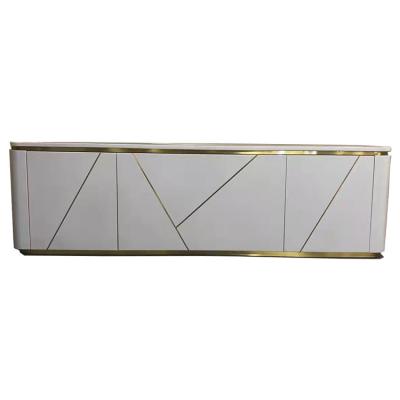 China Minimalist Elegant Minimalist TV Cabinet Light Stainless Steel Trim Living Room Stand Luxury Living Room Furniture for sale