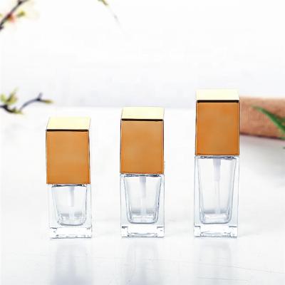 China Food/Cosmetic Flint Glass Bottles 15ml Glass Lotion Cosmetic Essential Oil Bottle With Pressure Pump for sale