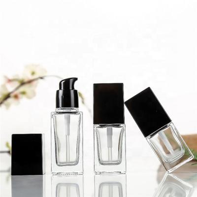 China 30ml Food Flint Bottles Pressure Pump Glass Cosmetic Glass Lotion Bottle/Cosmetics China Supplier for sale