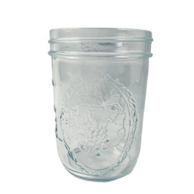 China Glass Food Jar 66mm CT Top Candle Shaped Embossed With Line 200ml Mason Caviar Scale Glass Jar for sale