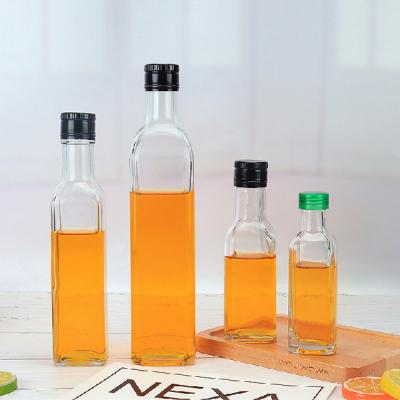 China Olive Oil Packaging 500ml 750ml Transparent Square Empty Glass Bottles For Olive Oil Vinegar For Sale for sale