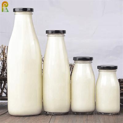 China Premium Eco-Friendly Recycled Glass Juice Milk Drinking Water Bottle Juice Packaging for sale