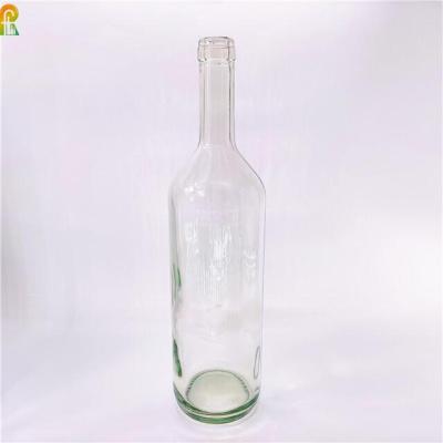 China Still Wine / Sparkling Wine Flint Glass Wine Bottle 1000ml With Cork Top Bordeaux Bottle With Flat Bottom for sale