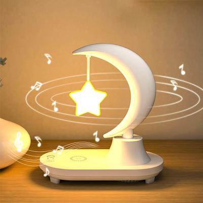 China Modern Living Room Lamps Bedrooms Magic Moving Night Light Wireless Charging 7 Color Adjustable Music Player Night Lights for sale