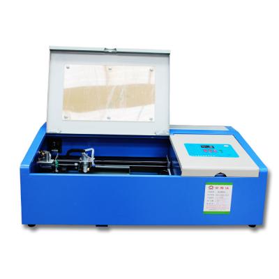 China Laser Engraving Wholesale MODLASER CO2 Laser Cutting Machine 3020 for Engraving Acrylic Stamp for sale